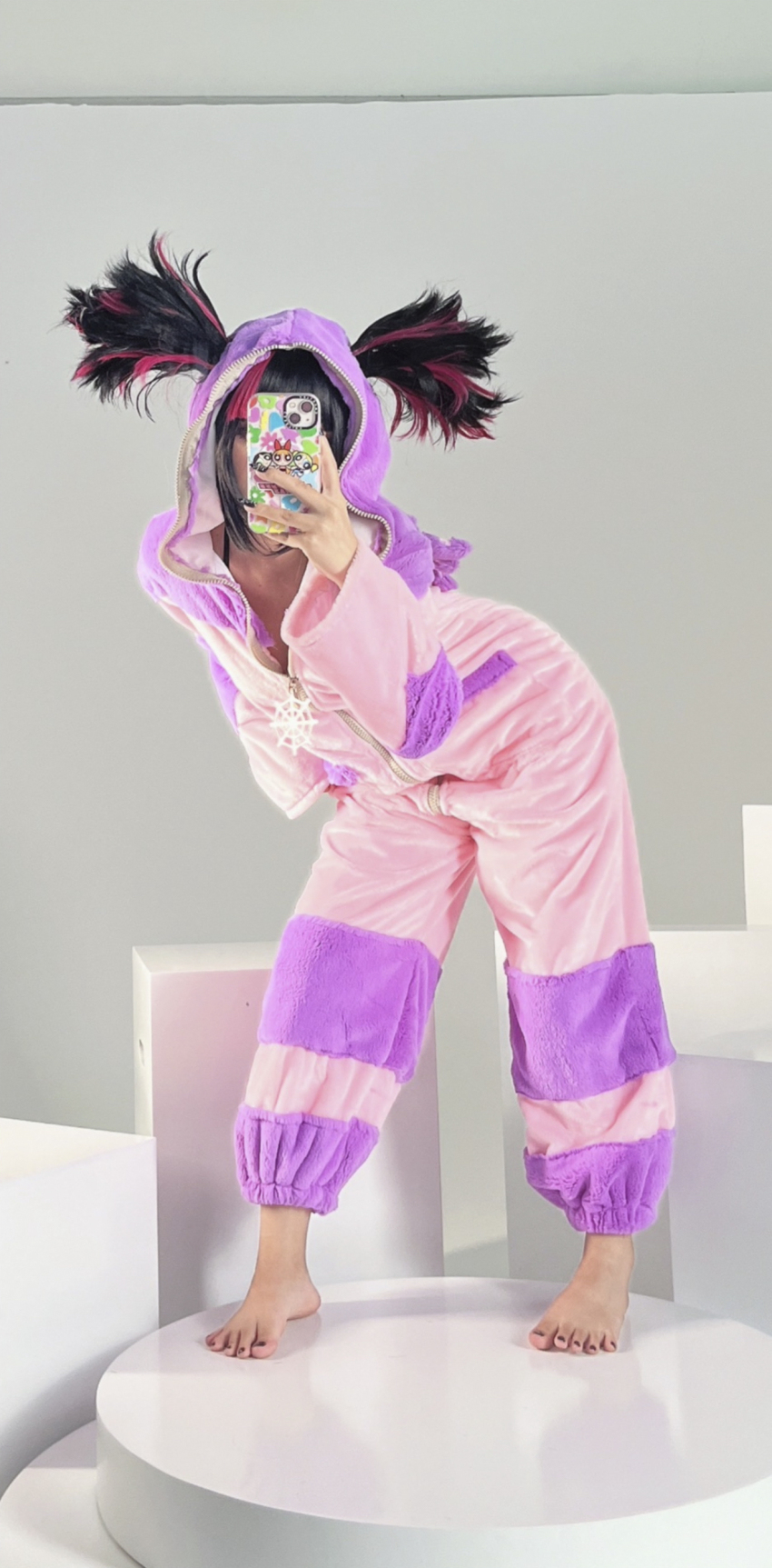 1girl alternate_costume asian barefoot bent_over black_hair cosplay feet female female_only japanese juri_han nail_polish onesie pajamas pink_hair selfie solo sourced standing street_fighter toenail_polish toes twintails two_tone_hair umeko_j