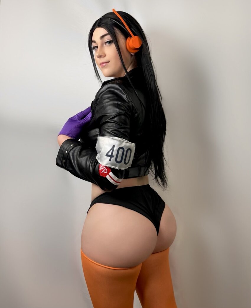 1girl ass ass_focus black_hair buttercupcosplays cosplay long_hair nico_robin one_piece smile solo standing