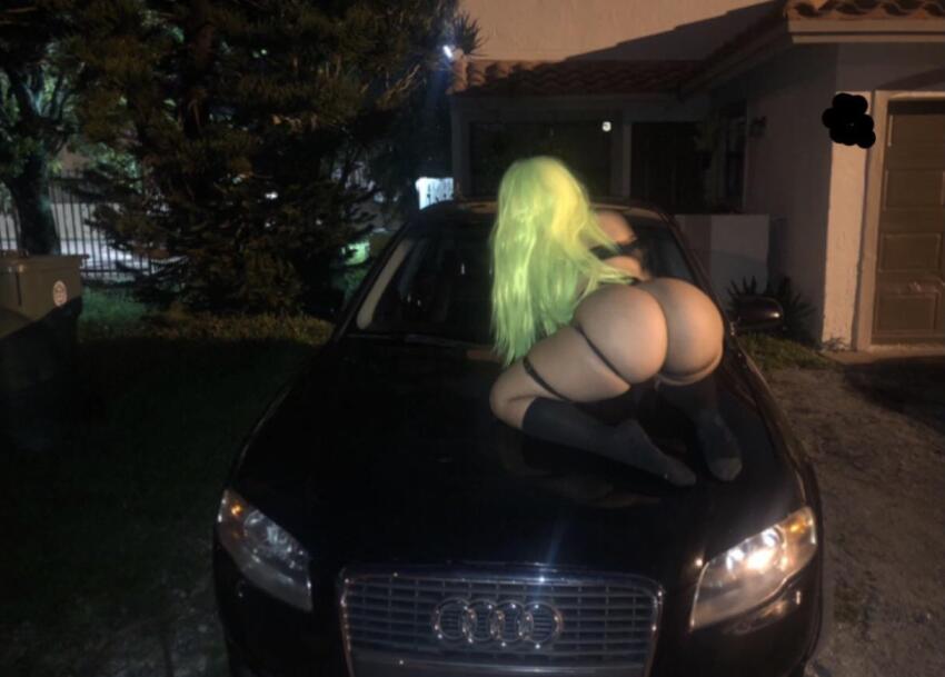 1girl big_ass car divinexdoll green_hair huge_ass night on_car reddit wig