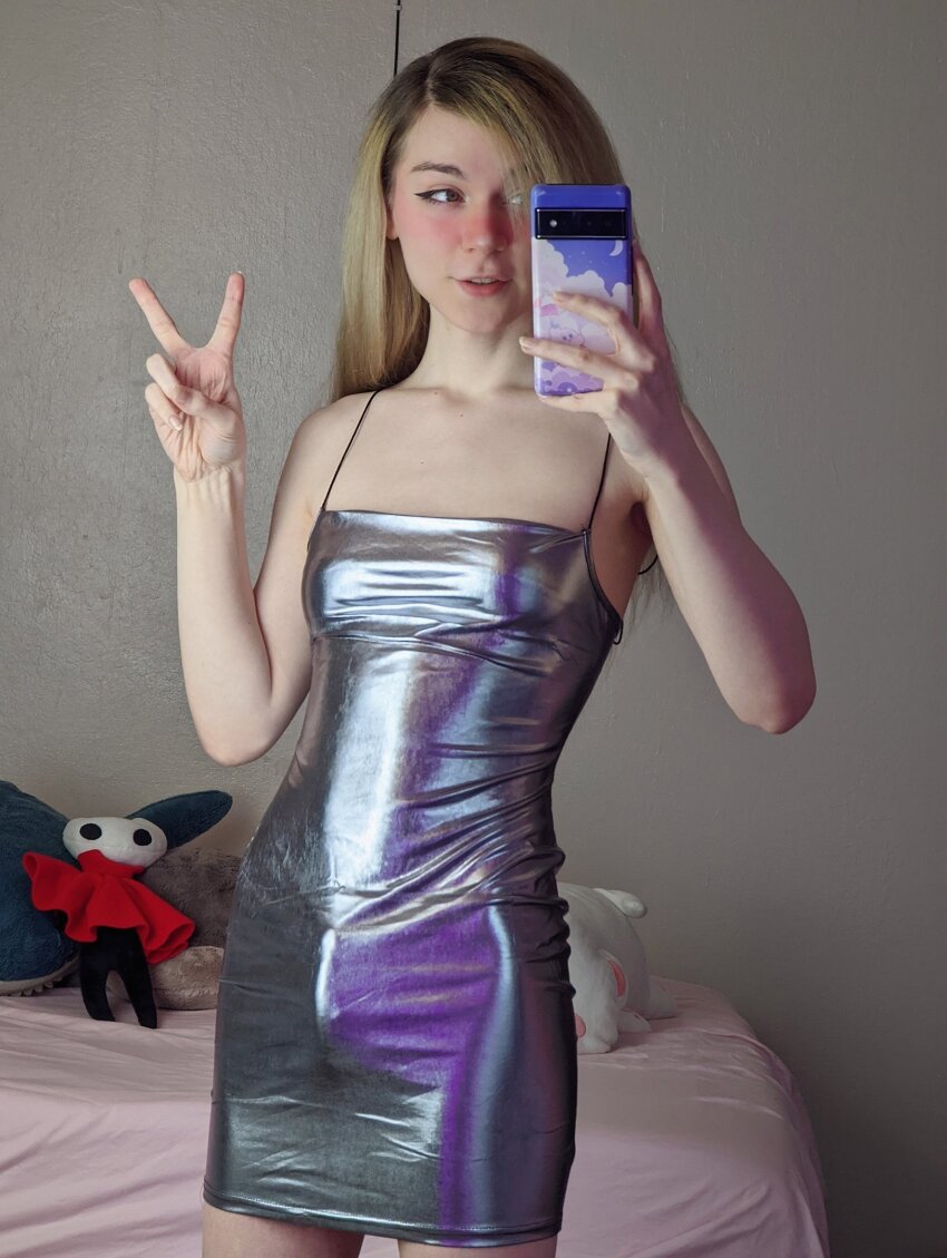 1trans blonde_hair bulge clothed dress looking_away non-nude oncloud_e parted_lips peace_sign phone posing selfie solo tight_fit transgender trap white