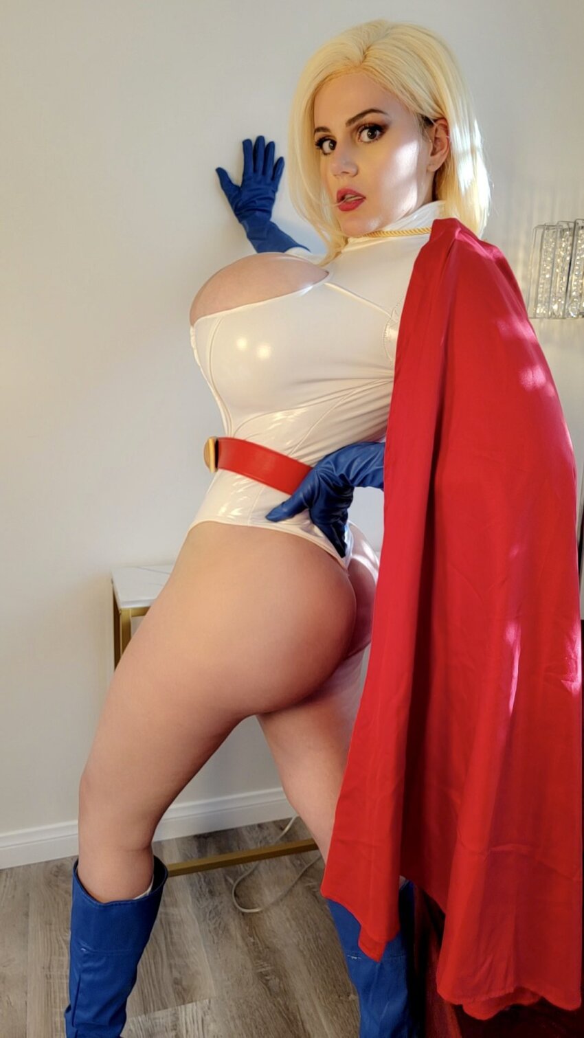 ass breasts cape cosplay female huge_breasts implants jazmyne_day jazmynedayy power_girl powergirl superheroine surprised