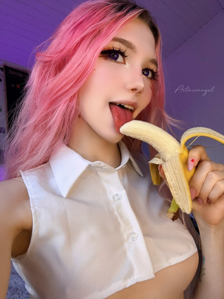 1girl armpits banana contact_lens licking long_hair pink_hair solo tongue underboob