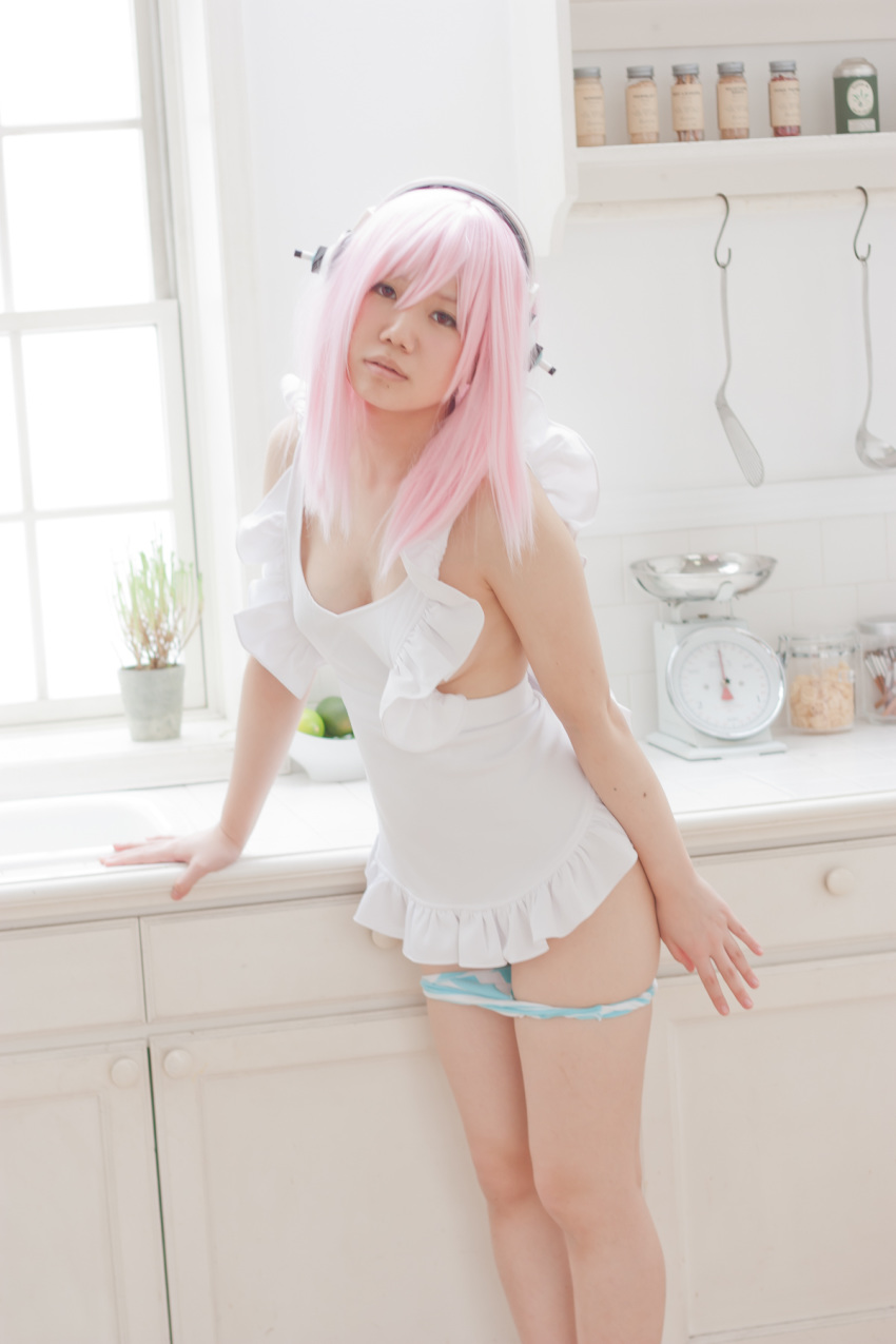 apron asian breasts cosplay female headphones kitchen long_hair panties pink_hair solo