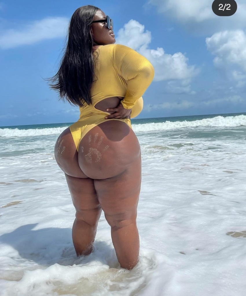 ass beach big_ass big_lips black_hair blue_sky dark-skinned_female dark_skin fat_ass glasses instagram landscape ocean thick thick_ass thick_legs thick_thighs