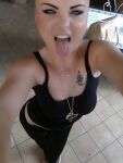 breasts clothed female female_only looking_at_viewer mascara necklace selfie solo tank_top tattoo tongue tongue_out rating:Explicit score:5 user:Lemons22