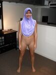 1_female 1_girl 1_human arab bottomless female female_human female_only hijab human indoors looking_at_viewer muslim navel_piercing photo piercing pussy real_person shaved_pussy smile solo standing rating:Explicit score:5 user:xbooru
