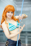 asian bikini_top cosplay lily_(iii) nami nami_(one_piece) one_piece orange_hair swimsuit three_piece_rod trousers rating:Explicit score:0 user:xbooru