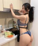 1girl apron asian ass big_ass big_lips black_hair blue_bra bra clothed cooking dat_ass female female_only food hair_over_one_eye indoors japanese kitchen lipstick long_hair long_ponytail looking_at_viewer looking_back ms_puiyi parted_lips ponytail siew_pui_yi solo rating:Explicit score:15 user:MegaSimp