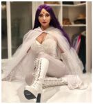 cleavage cosplay dc dc_comics looking_at_viewer milf photo purple_hair raven raven_(cosplay) tara_strong teen_titans rating:Explicit score:16 user:XXTarastrongXX