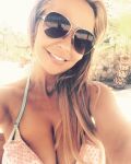 big_breasts bikini blonde_hair cleavage looking_at_viewer solo tara_strong rating:Explicit score:14 user:XXTarastrongXX