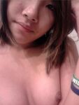 1girl asian breasts brown_hair chinese female girlfriend long_hair nipples selfie smile rating:Explicit score:7 user:Makomako