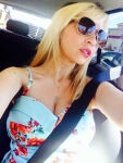 big_breasts blonde_hair cleavage dress female solo tara_strong rating:Explicit score:10 user:XXTarastrongXX