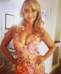 big_breasts blonde_hair cleavage dress looking_at_viewer solo tara_strong rating:Explicit score:10 user:XXTarastrongXX