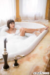 1girl bathtub bob_cut breasts brown_eyes brown_hair bubble_bath female_focus female_only highres indoors janice_griffith latina petite picture short_hair skinny small_breasts solo solo_female solo_focus vixen.com rating:Explicit score:5 user:bilbobaggins