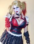 1girl abi_aikou batman_(series) blonde_hair breasts cleavage cosplay cosplay_photo dc_comics female female_focus female_only harley_quinn harley_quinn(cosplay) harley_quinn (cosplay) large_breasts looking_at viewer one_eye closed photo red_hair smile solo twintails two_tone hair wink