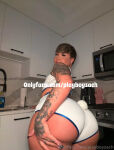 1boy ass big_ass booty_shorts brown_hair brunette bunny_tail face_tattoo fake_nails femboy feminine kitchen lipstick looking_at viewer looking_back makeup male male_focus male_only male_solo onlyfans pawb playboyzach presenting_ass short_hair shorts solo standing tattoo text thick trap watermark