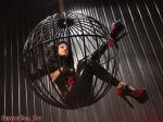 black_hair breasts cage female high_heels large_breasts latex long_hair pasties rubberdoll shoes solo