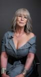1girl actress big_breasts bracelet breasts celebrity chair cleavage female female_focus female_only female_solo gilf glasses jamie_lee curtis lipstick long_hair looking_at viewer makeup mature milf necklace on_chair sitting smile smiling solo white_hair