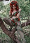 1girl breasts cosplay cosplay_photo dc_comics female female_focus female_only looking_at viewer photo photo_(medium) poison_ivy poison_ivy (cosplay) red_hair solo tree