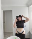 1girl blacked_clothing crop_top glasses goth gothgirlgamer133 mirror_selfie pants_down pawg selfie septum_piercing solo_female tattoo thick