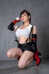asian_female black_hair cosplay earrings final_fantasy vii gloves japanese japanese_(nationality) japanese_female luna_amemiya red_boots suspenders tifa_lockhart white_tank top