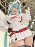 1girl armpits blue_hair bodysuit cosplay female_focus hatsune_miku highres long_hair miniskirt skirt solo thick_thighs thighs white_skirt