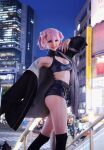 1girl ass ass_focus black_shorts breasts call_of_the_night city cleavage cosplay female_focus legs medium_breasts nanakusa_nazuna shorts smile solo