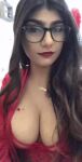 1girl bra breasts cleavage dark_hair female female_only glasses looking_at_viewer mia_khalifa no_sound non-nude partially_clothed pornstar smile solo tan_skin webm