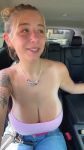 big_ass blonde_hair cleavage clothed clothed_female huge_breasts in_car large_breasts long_hair necklace tagme tattoos tiktok webm