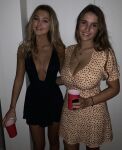2girls amateur blonde_hair brown_hair clothed clothed_female female female_focus female_only huge_breasts long_hair looking_at viewer medium_breasts size_difference smile