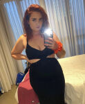 26 australian australian_female bed bedroom bisexual cleavage curvy curvy_female curvy_figure looking_at viewer mirror mirror_selfie redhead scrunchie selfie