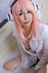 1girl asian breasts cosplay female headphones high_heels long_hair pink_hair shoes skirt solo super_sonico