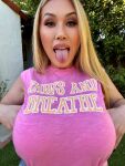 1girl asian big_breasts blonde blonde_hair breasts chinese female female_focus female_only female_solo kianna_dior lipstick long_hair looking_at viewer makeup massive_breasts mature milf open_mouth outside pornstar shirt solo standing text tongue tongue_out