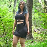 absurdres altered_common sense bare_shoulders beautiful_woman black_skirt blue_fingernails blue_hair braless brown_hair character_request collarbone erect_nipples erect_nipples under shirt happy_trance highres hypnosis hypnotized leaning_to the side long_hair mature_woman mind_control model_request navel no_bra original plants short_skirt skirt smiling standing tomboyish tube_top unaware wide_hips woods