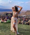 armpit asian_female dyed_hair glitter music_festival outdoors rave scenery skirt topless