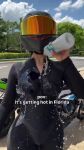 1girl athletic athletic_female bodysuit female_only fit fit_female helmet motorcycle_helmet pouring_liquid tagme tight_clothes video video_with sound water webm wet wet_clothes