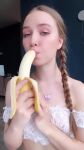 animated banana banana_in mouth breasts brown_hair eating eating_food fellatio_gesture female female_only girl long_hair looking_at viewer music see-through see-through_top small_breasts solo sound tagme tinyangelx webm