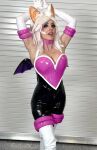 armpits arms_behind head bat_ears bat_wings choker cleavage cosplay eyeshadow fake_breasts jessica_nigri large_breasts light-skinned_female long_gloves open_mouth rouge_the bat rouge_the bat (cosplay) sega skin_tight sonic_the hedgehog (series) twitter white_hair