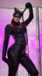 1girl batman_(series) catwoman clothed cosplay dc female leather long_hair looking_at_viewer morgpie pale-skinned_female red_hair seductive seductive_look solo sourced tight_clothes whip