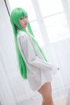 1girl aizawa_ren asian breasts c.c. code_geass cosplay female green_hair long_hair oversized_clothes solo