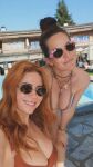 2girls big_breasts bikini breasts brown_hair celebrity cleavage female huge_breasts large_breasts massive_breasts orange_hair palina_rojinski red_hair redhead sister sisters sunglasses tits voluptuous