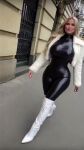 1girl ass ass_focus blonde blonde_female blonde_hair bodysuit dat_ass knee_high boots latex latex_suit looking_at viewer tagme thick_thighs thighs video walking webm