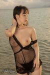 1girl asian asian_female babydoll beach black_hair breasts clothed dress earrings female female_only japanese japanese_female jav large_breasts nipples nipples_visible through clothing open_clothes panties panties_visible through clothing photo sannomiya_tsubaki sea see-through see-through_dress see_through clothing short_hair solo straight_hair water