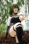 1girl ass cosplay green_hair highres miniskirt real_life skirt solo sousou_no_frieren ubel_(sousou_no_frieren) ubel_(sousou_no_frieren)_(cosplay)