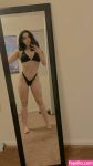 1girl amberthevalkyrie black_bikini black_hair curly_hair fake_nails fapello.com female mirror_selfie muscular_female piercing realamberthevalkyrie solo tattooed_girl