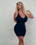 1girl arms_up bare_arms bare_thighs black_dress blonde_hair bracelet cleavage earrings gold_bracelet huge_breasts huge_tits italian italian_female lali957 long_hair looking_at viewer non-nude overflowing shaved_armpits smile standing tight_dress valentina_di rocca
