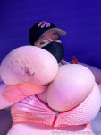 1girl areolae big_breasts breasts chyna_chase female female_focus female_only female_solo hat holding_breasts looking_at viewer mask massive_breasts nipple_piercing nipples onlyfans piercing solo text topless watermark