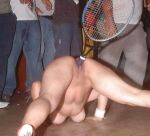 1girl audience breasts clothed_male nude female crowd exhibitionism face_down ass up multiple_boys object_insertion public pussy tennis_racket