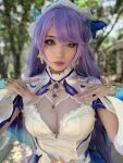 1girl blue_eyes breasts cantarella_(wuthering waves) cleavage cosplay emiru looking_at viewer purple_hair solo streamer twitch twitch_streamer