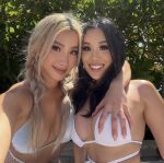 2girls asian fake_eyelashes hand_on breast smile white_lingerie